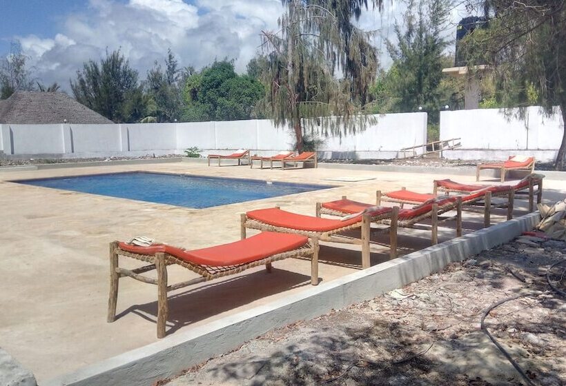 בית מלון כפרי Twisted Palms Lodge & Restaurant