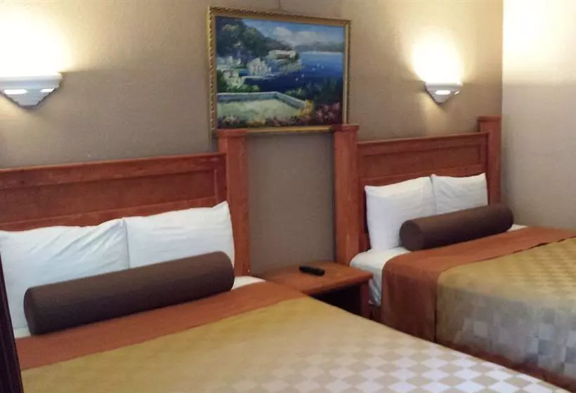 فندق على الطريق Paradise Inn & Suites