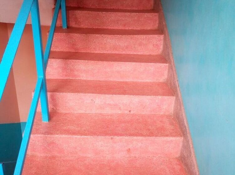 هتل At Ease Guest House