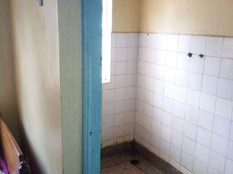 هتل At Ease Guest House