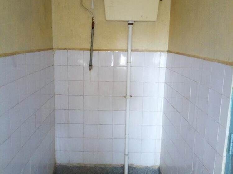 هتل At Ease Guest House