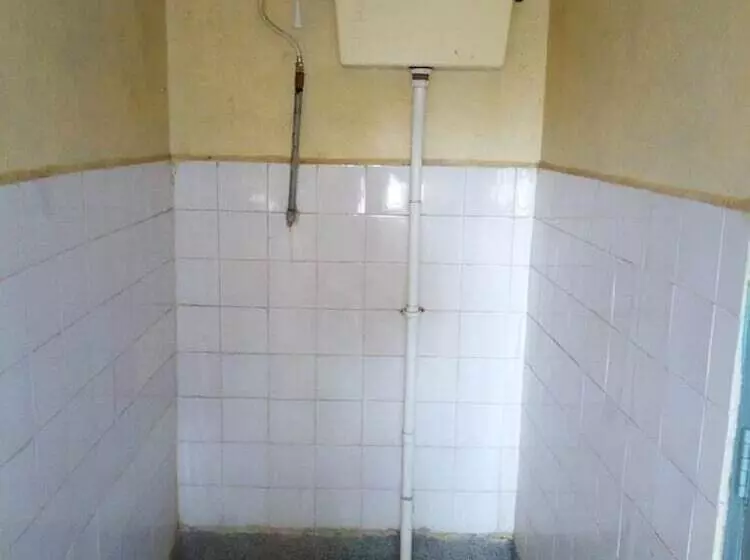 هتل At Ease Guest House