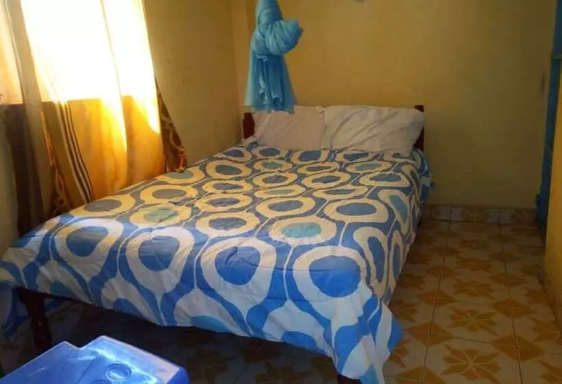 هتل At Ease Guest House