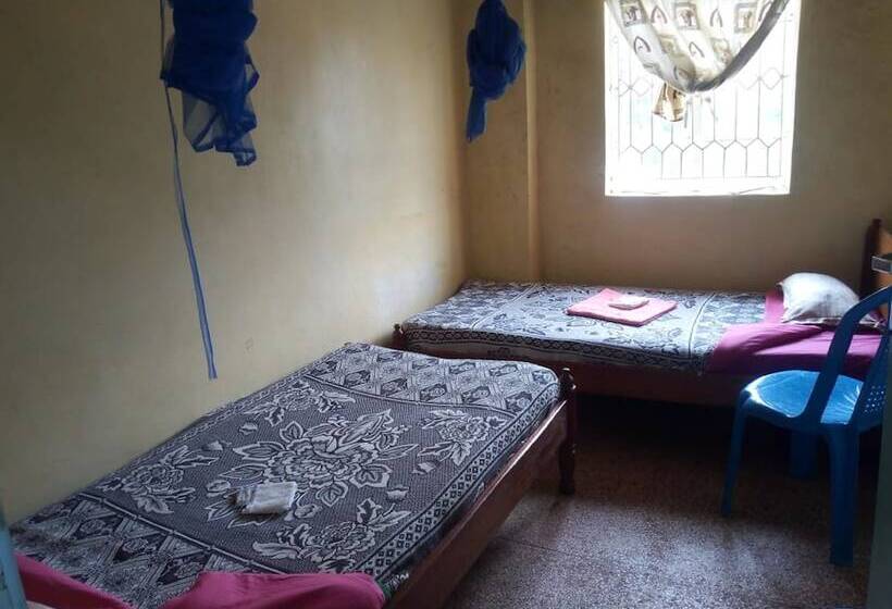 هتل At Ease Guest House