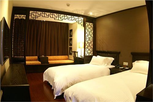 فندق Baolong Homelike Mudanjiang