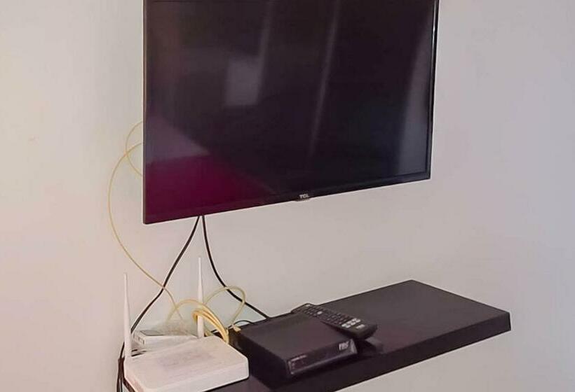 Отель Redliving Apartemen Mekarwangi Square   Agus 2 Tower A