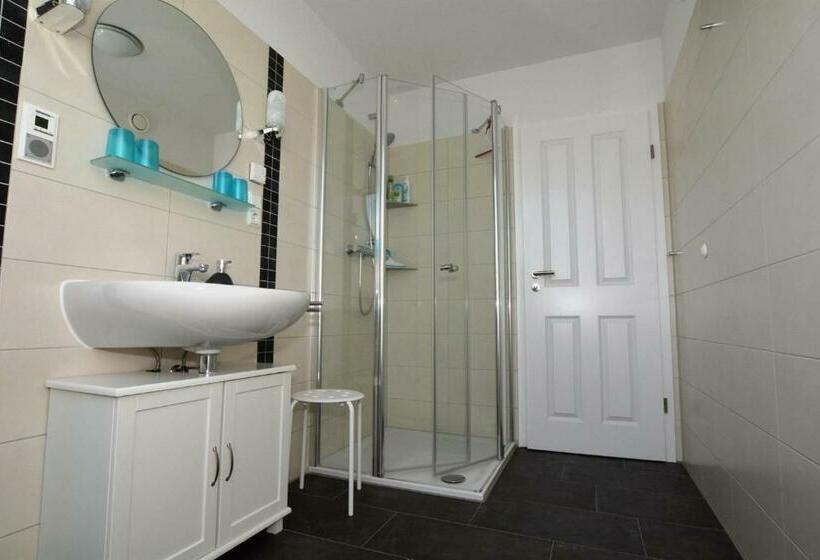 펜션 Fremdenzimmer Lütje Huske