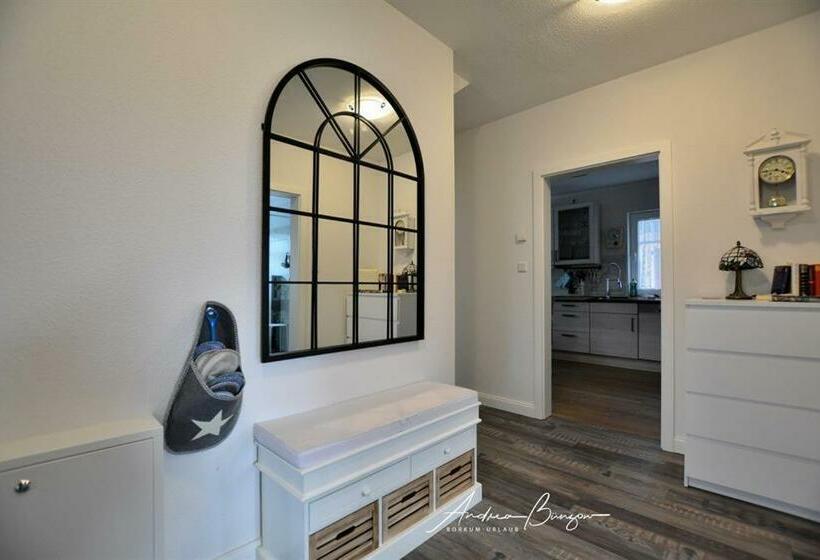 펜션 Fremdenzimmer Lütje Huske