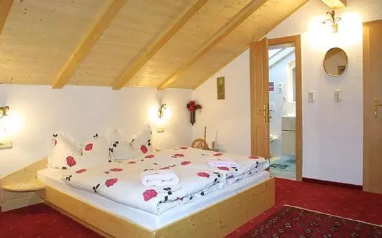 ホテル Ferienhaus Tasser
