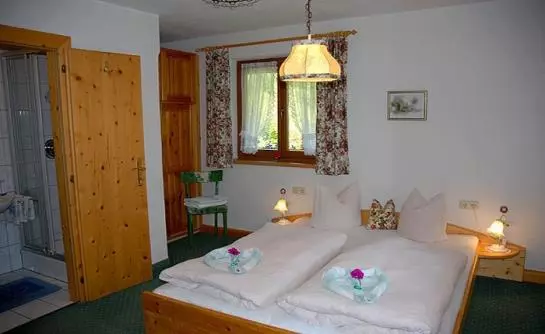 ホテル Ferienhaus Tasser