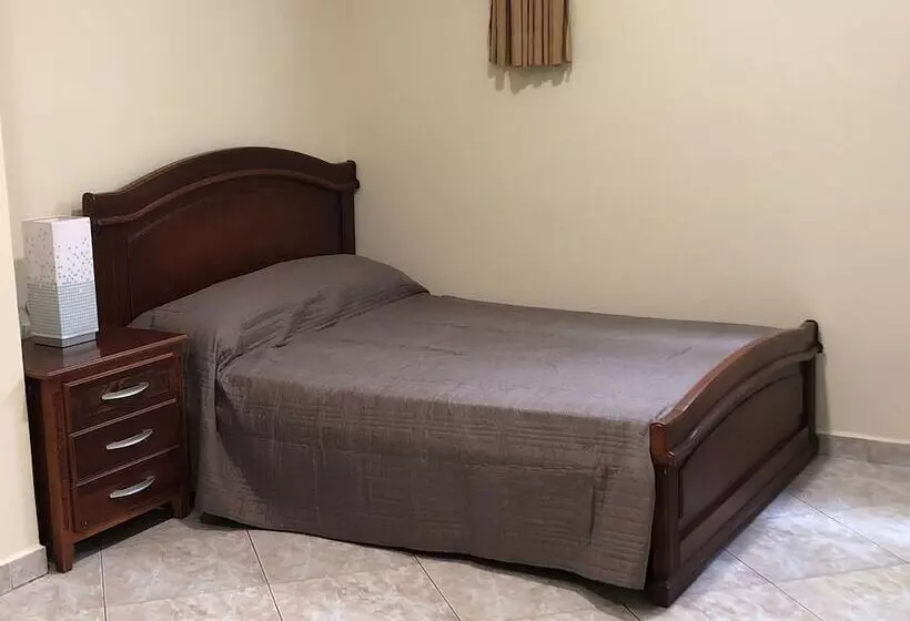هتل Lodging Ecuador Habitaciones & Suites