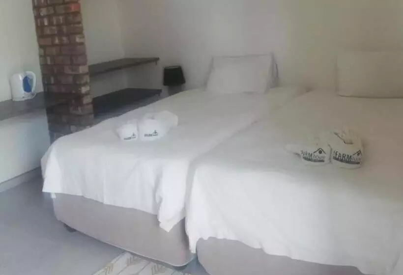 پانسیون The Farmhouse Boutique Guesthouse And Beergarden Cc