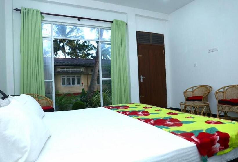 Pensionat Sandy Palms Guesthouse