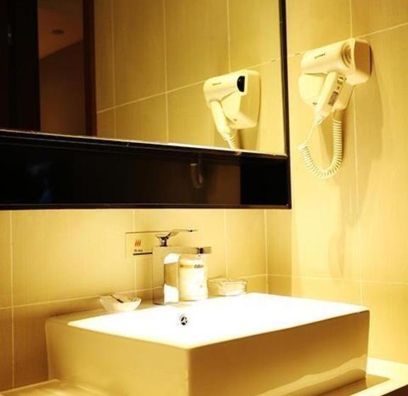 בית מלון כפרי Jtour Inn Wuxi Railway Station Shangmadun Metro Station