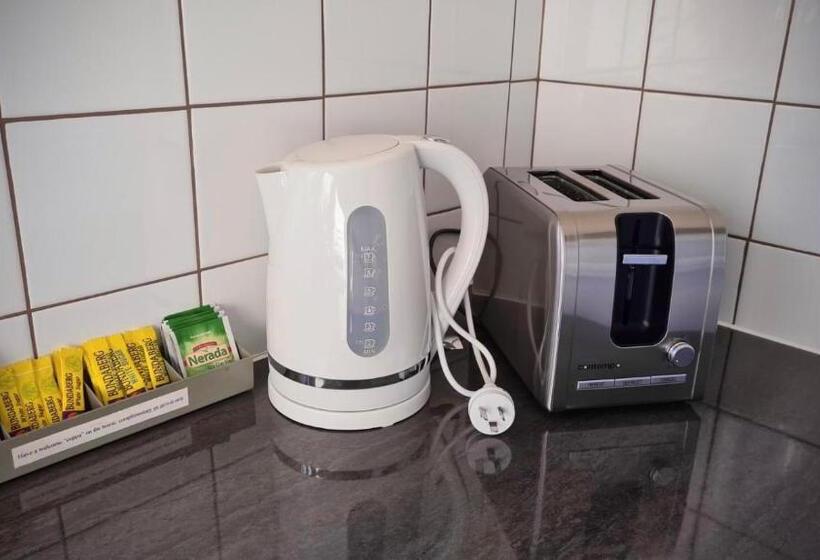 בית מלון כפרי Paradise Court Holiday Units