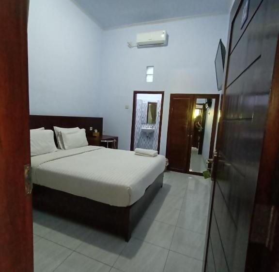 تختخواب و صبحانه Artha Graha Homestay