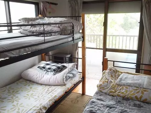 פנסיון Guest House Shiraho Friends House