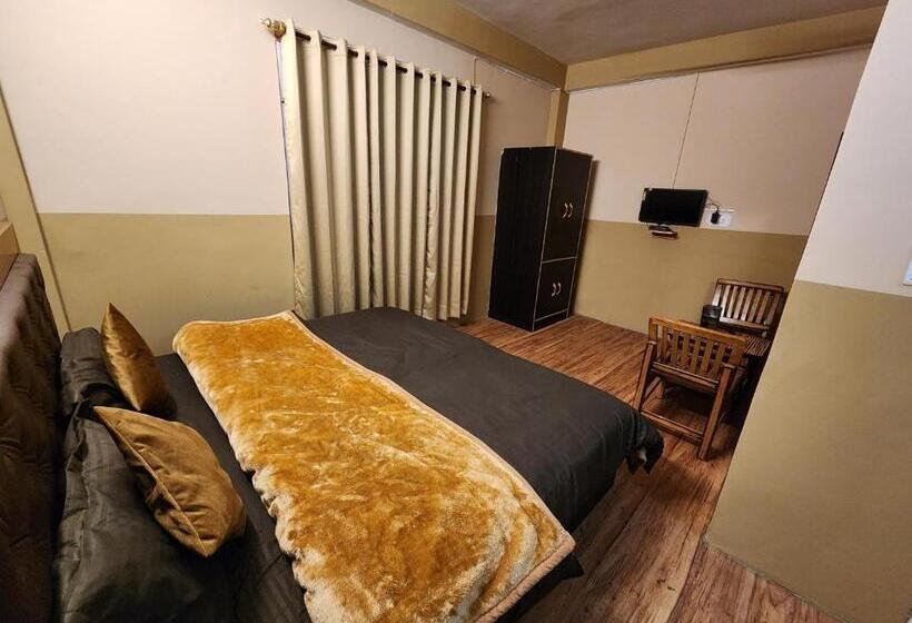 Отель Woodzo Kasol