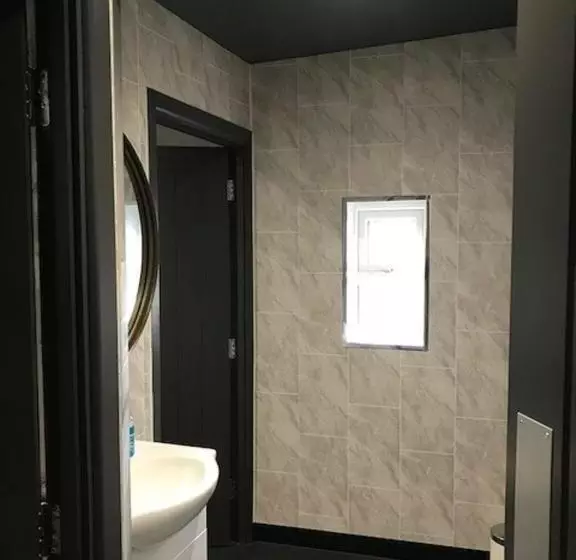 Отель The Farmers Boy Inn Guest House