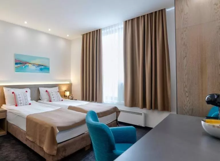 تختخواب و صبحانه Studio U Hotelu Alibi Inn