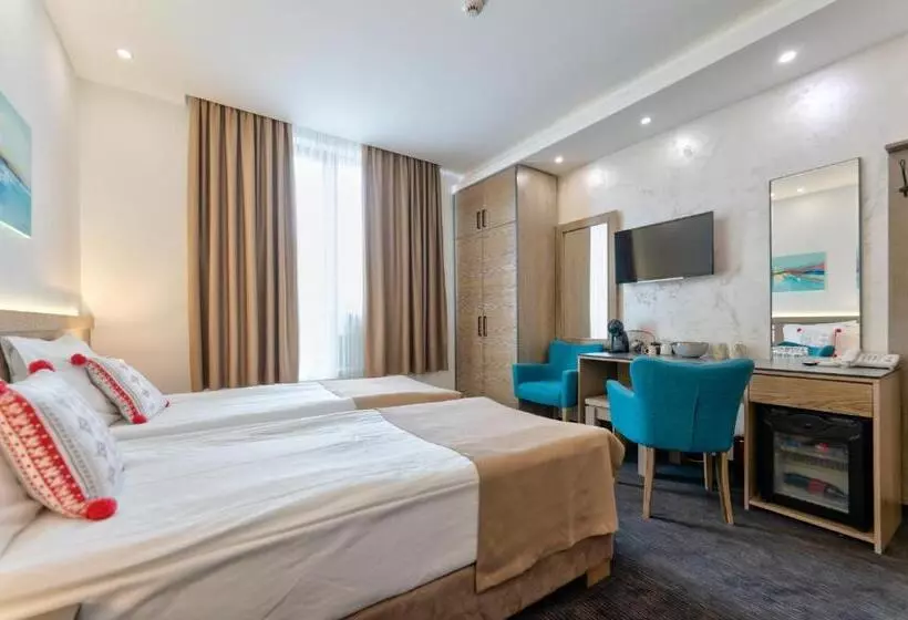 تختخواب و صبحانه Studio U Hotelu Alibi Inn