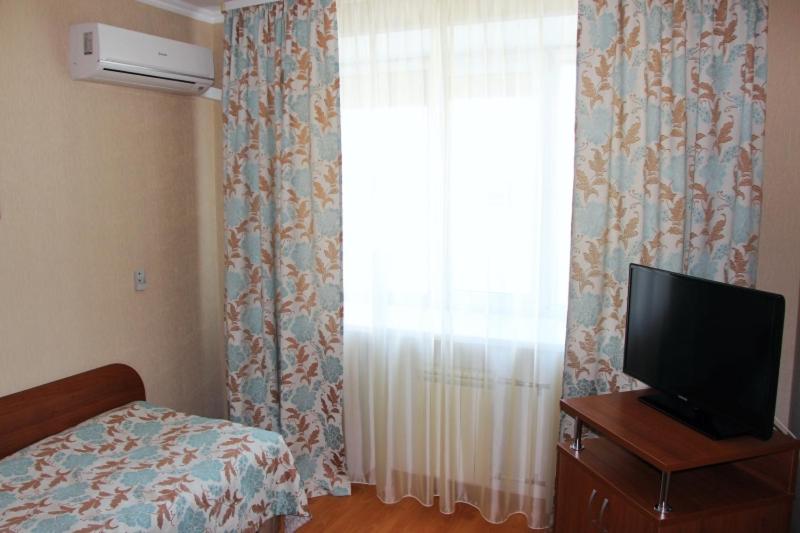 Отель Cosmos Business