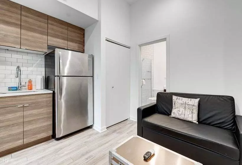 Amenities No Hotel Room Can Match! Full Kitchen And In Unit Laundry!   747 Lofts Cabin 306  By Redaw