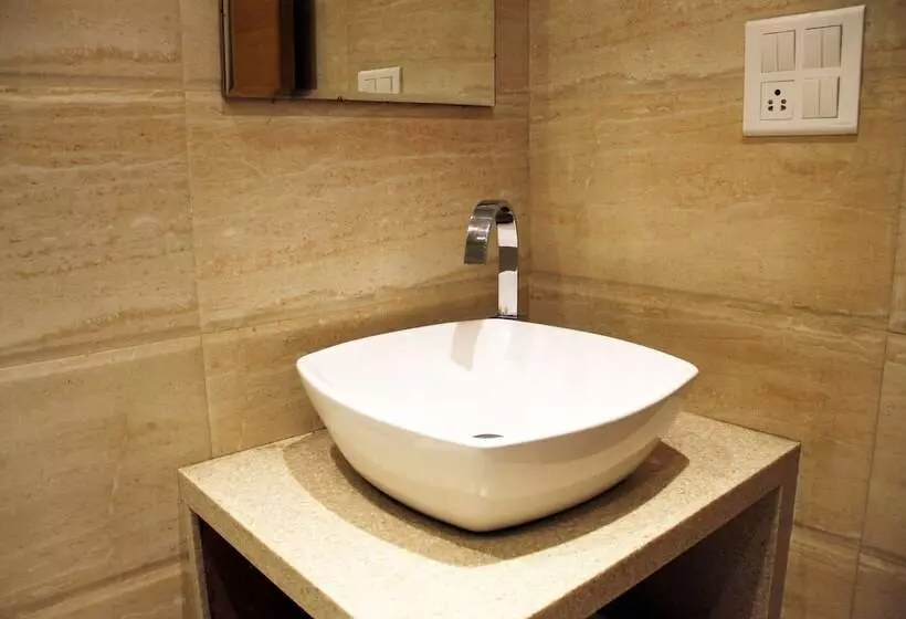 هتل Capital O 419 A Suites