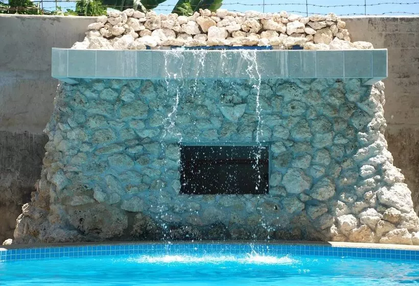 פנסיון Lapu Lapu Cottages & Restaurant