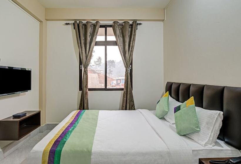 בית מלון כפרי Treebo Staying Center