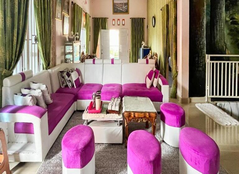 Отель Anaqi Homestay Mitra Reddoorz