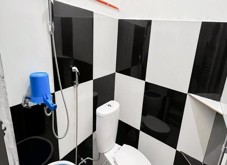 Отель Anaqi Homestay Mitra Reddoorz