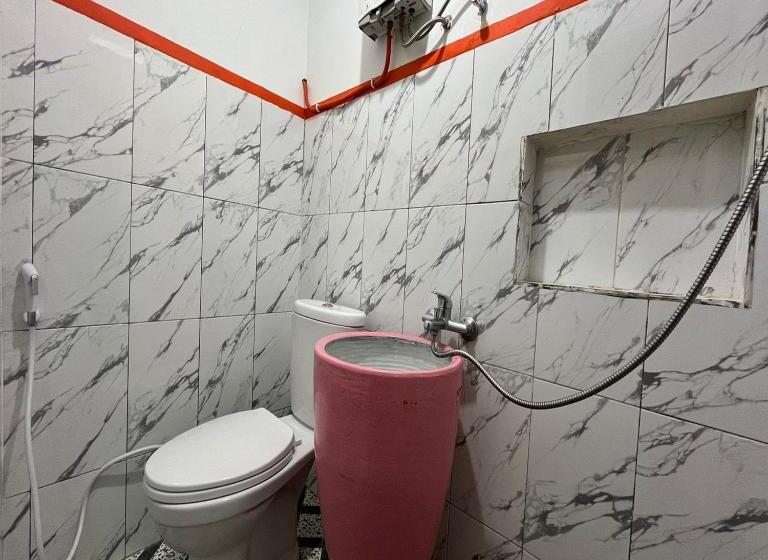 Отель Anaqi Homestay Mitra Reddoorz