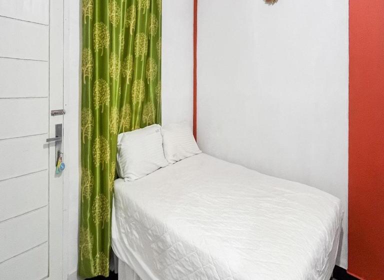 Отель Anaqi Homestay Mitra Reddoorz