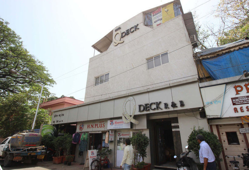 Отель Q Deck Rooms