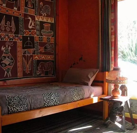 فندق صغير Global Village Travellers Lodge