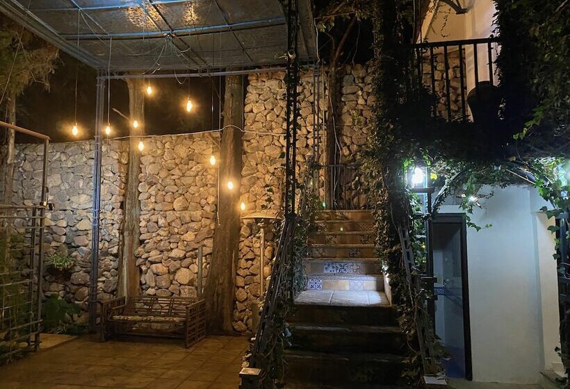 호텔 Magnolias Jardin & Boutique Suites