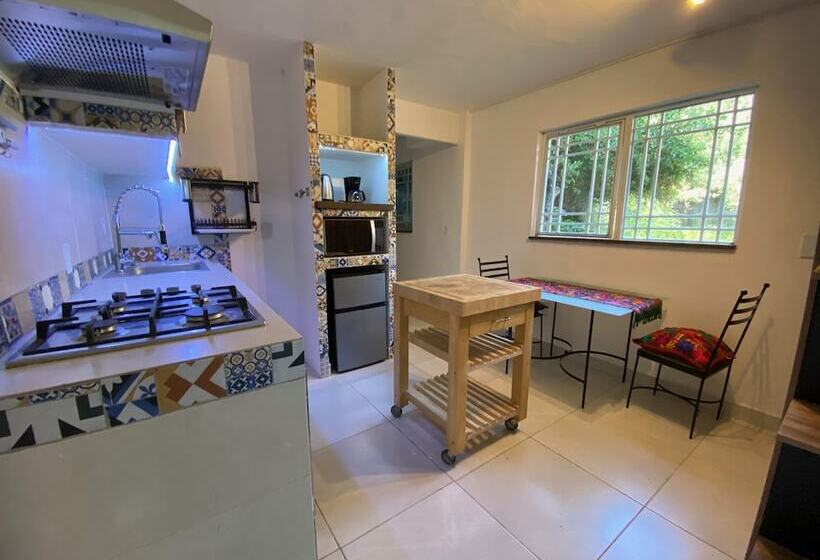 호텔 Magnolias Jardin & Boutique Suites