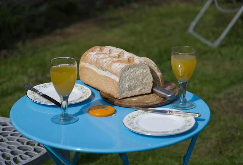 A Quirky Garden Building In An Orchard