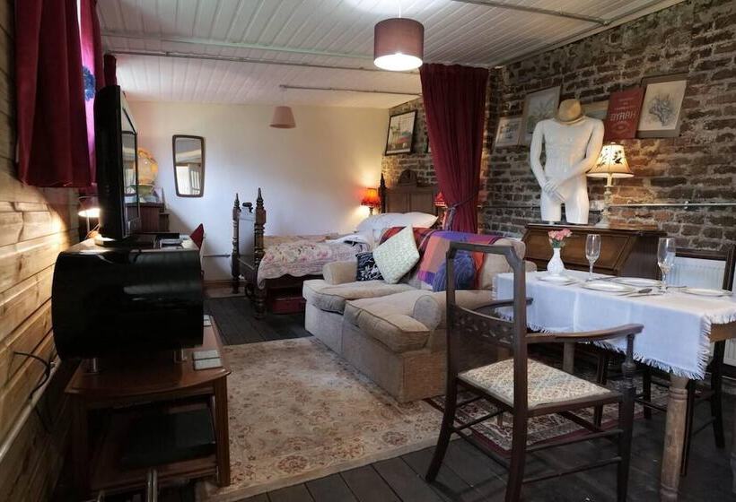 A Quirky Garden Building In An Orchard