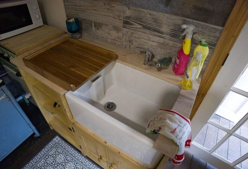 A Quirky Garden Building In An Orchard