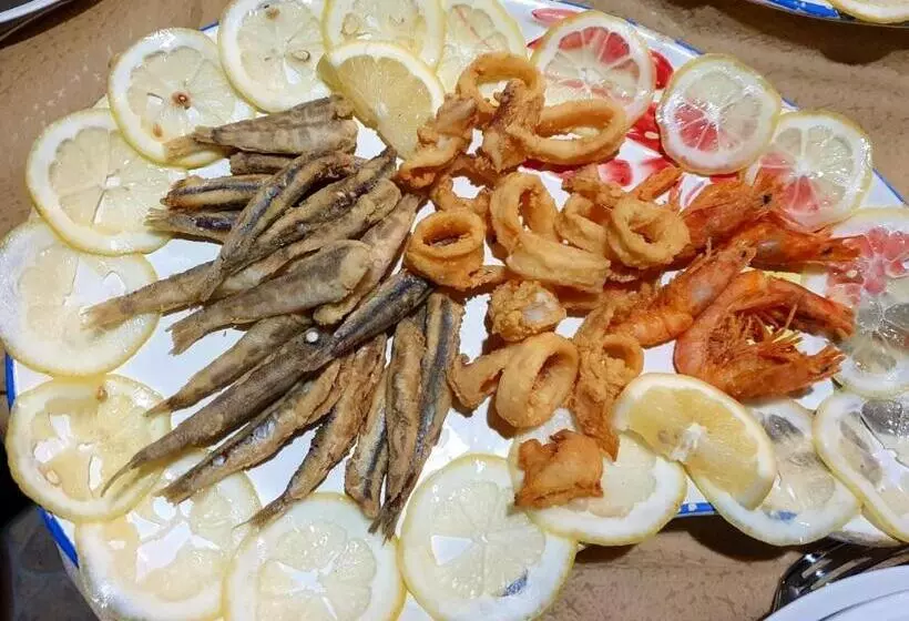 簡易ホテル Ristorante L'orizzonte