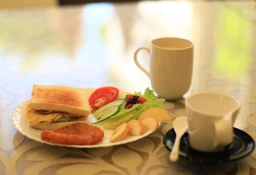 تختخواب و صبحانه Sunny Breeze Garden Homestay