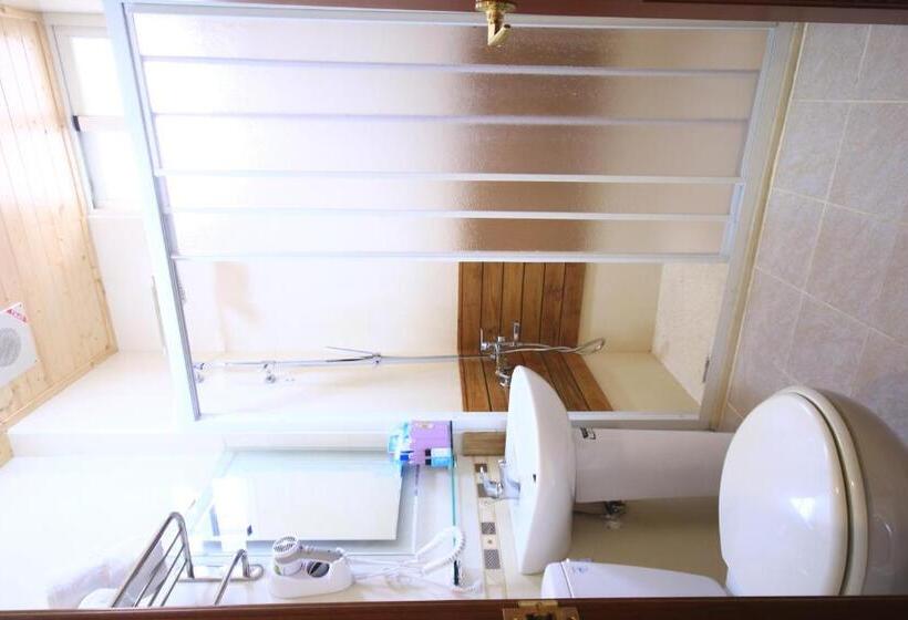 تختخواب و صبحانه Sunny Breeze Garden Homestay