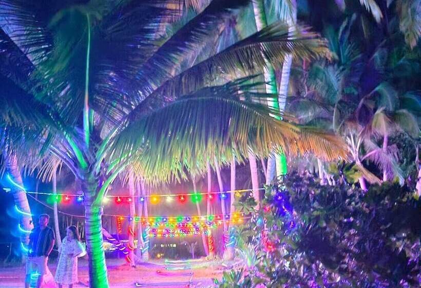 בית מלון כפרי Honeymoon Beach Resort