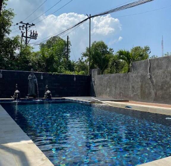 Отель Urbanview Ava Guest House Goa Gong