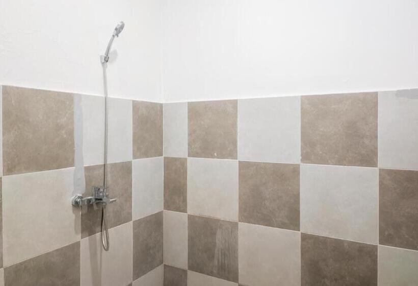 Отель Urbanview Ava Guest House Goa Gong