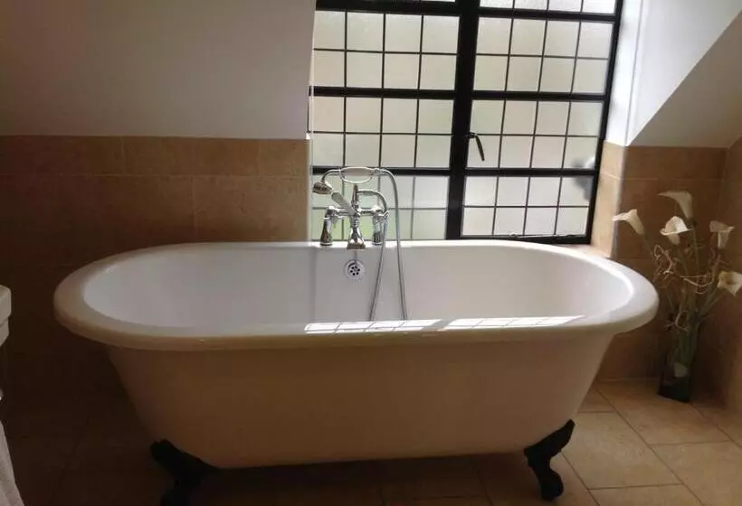 ペンション The Coach House