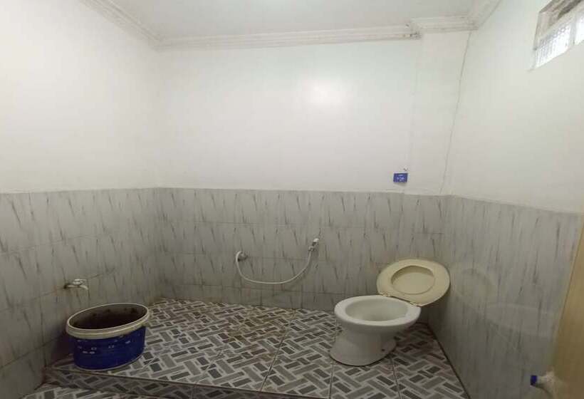 בית מלון כפרי Spot On 93385 Penginapan Hj Lilis 2 Syariah