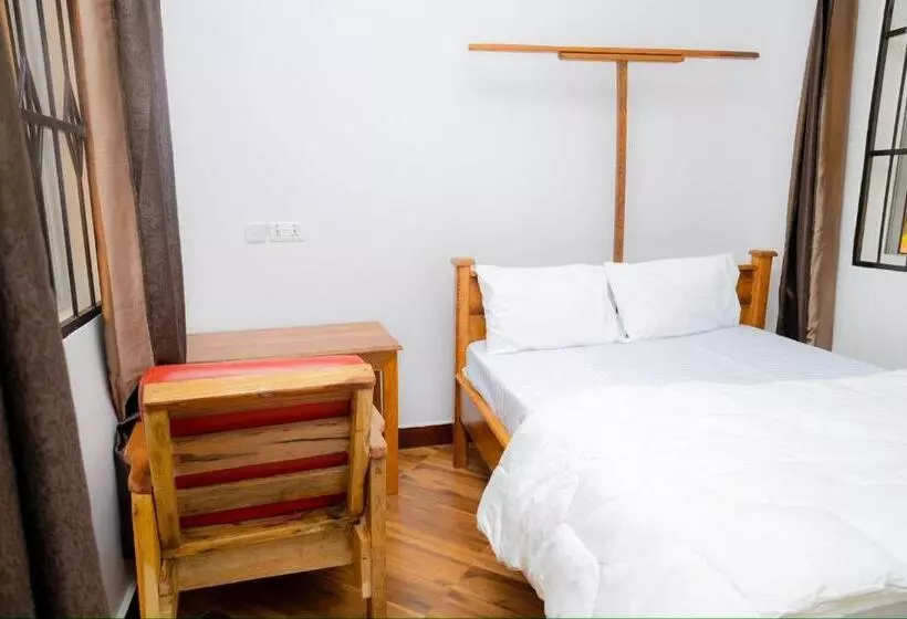 تختخواب و صبحانه Mangi Mangi Accomodation